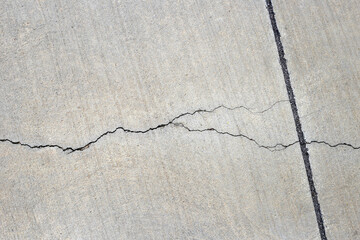 Crack concrete walkway texture background.