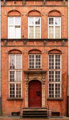 Antique carved wooden door of luxury gothic mansion	