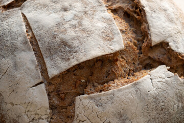 Closeup of sourdough bread on a wooden board