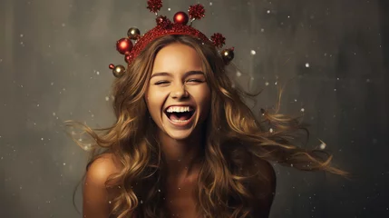 Poster Laughing girl with ornaments on head made of Christmas balls © Maryna