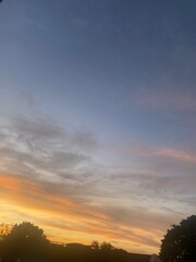 Fototapeta na wymiar sunset over the field. New day, new month, new opportunity. Sunrise of the 1st of November 2023.