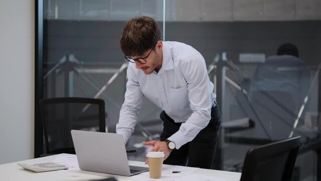 In an atmosphere filled with tension, a flustered businessman paces anxiously in office. His furrowed brows and restless movements reflect the depth of nervousness.