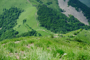 View of the green slopes of the mountains