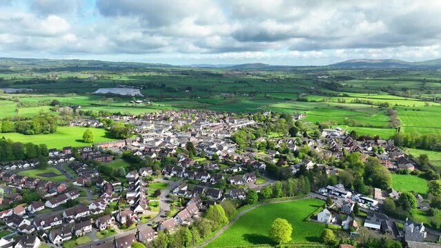 Aerial video of Residential housing in Doagh Village County Antrim Northern Ireland