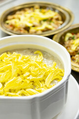 fish soup with chrysanthemum petals