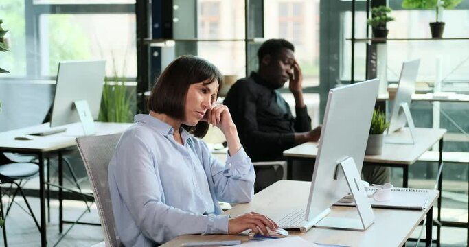 Exhausted managers working tirelessly in the office, show signs of fatigue. Their dedication to roles is evident, even in moments of weariness, as they strive to meet responsibilities.