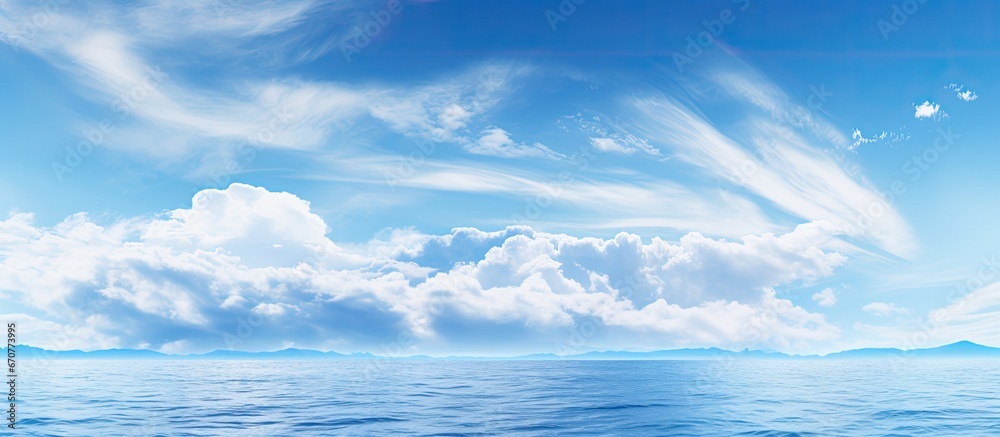 Sticker Cloudy sky overlooking the seas scenic backdrop