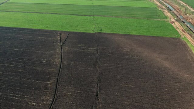 The image of the broken fault line stretching for kilometers of a very large earthquake in the agricultural area.Faults of the earth crust, consequence of the earth.Fault line break.Disaster results.