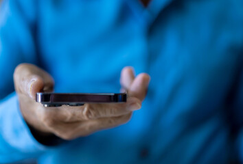 People use smartphone playing, concept of social media communication and digital online, work, online social media, online marketing, technology, chat, post, like, follow at phone screen.