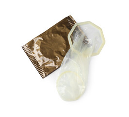 Unrolled female condom and package isolated on white, top view. Safe sex