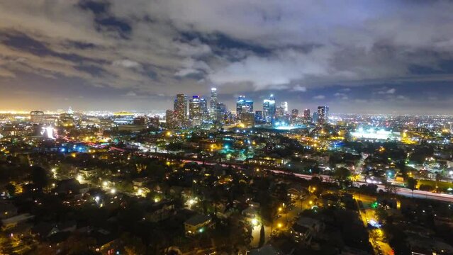 Aerial Time Lapse Shot Of Illuminated Buildings In City Against Sky At Night - Los Angeles, California