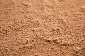 Loose face powder as background, closeup view