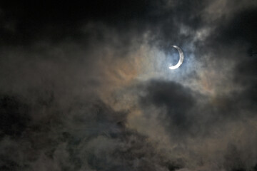 October 14 2023 Partial Eclipse and diffraction corona in clouds 400 miles from totality in the San...