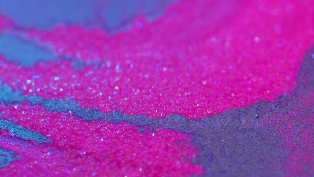 Ink background. Shimmering mix. Aroma bomb. Vibrant glamorous beautiful blue pink purple violet bath relaxation spa salt crystals blend flow.