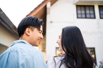 Asian young happy new marriage couple moving to new house together. 