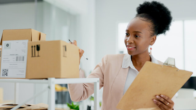 Happy black woman, box and checklist for inventory inspection, schedule delivery or courier service. African female person smile in small business, logistics or storage management at boutique store