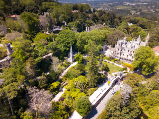Fototapeta na wymiar Quinta da Regaleira palace in the municipality of Sintra. Panoramic view from drone. Portugal