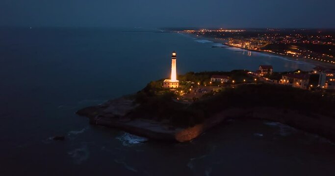 Biarritz, France Aerial view rocky cliff and lighthouse of Biarritz in the night