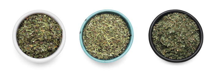 Dry tarragon in bowls isolated on white, top view