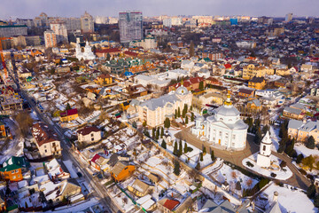 Obraz premium Top view on a winter Alekseevo-Akatov monastery is surrounded by an old residential neighborhoods in the city of ..Voronezh, Russia