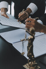 Naklejka premium Business and lawyers discussing contract papers with brass scale on desk in office. Law, legal services, advice, justice and law concept picture with film grain effect