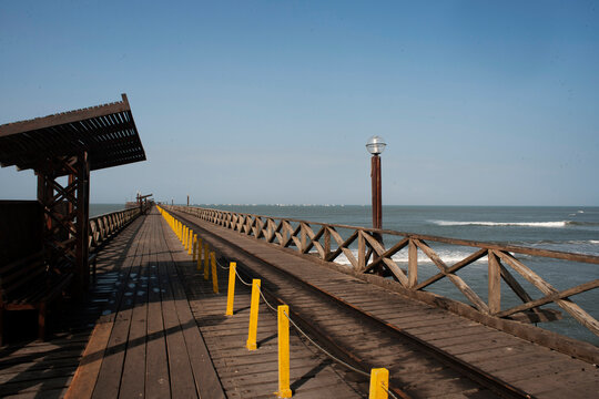 Old large wooden pier on the beach Pimentel in Lambayeque-PERU
