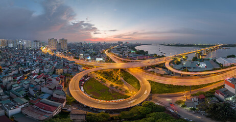 Aerial view of road interchange or highway intersection in Vinh Tuy bridge, Hanoi, Vietnam