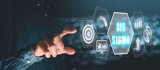 SIX sigma concept, Person hand touching six sigma icon on virtual screen with blue bokeh background.