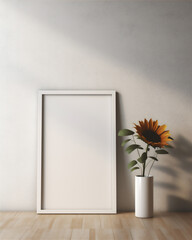 plain wall interior with empty photo frame mounted on the wall, tulip flowers in pot on the floor