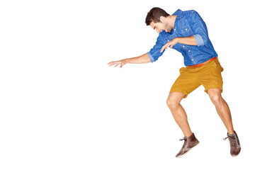 Jump, fashion and man with streetwear, excited and guy isolated against a transparent background. Male person, model and motion with trendy clothes, stylish and expression with png, move and energy