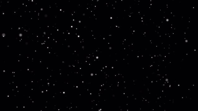 A mesmerizing loop animation of glittering particles falling down in slow motion with alpha channel