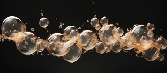 Fotobehang air bubbles in a liquid © 2rogan