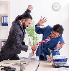 Two male colleagues in the office