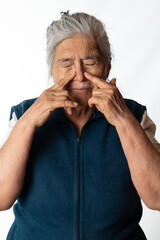 nose pain. Elderly woman with respiratory problems. White background.