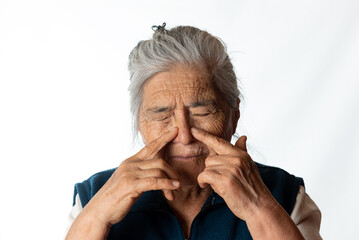 nose pain. Elderly woman with respiratory problems. White background.