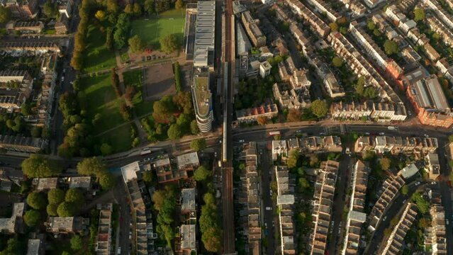 Aerial shot of London overground train stopping at Kentish town West station