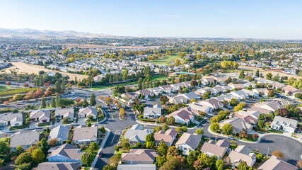 Drone photo over a community in Brentwood, California - Powered by Adobe