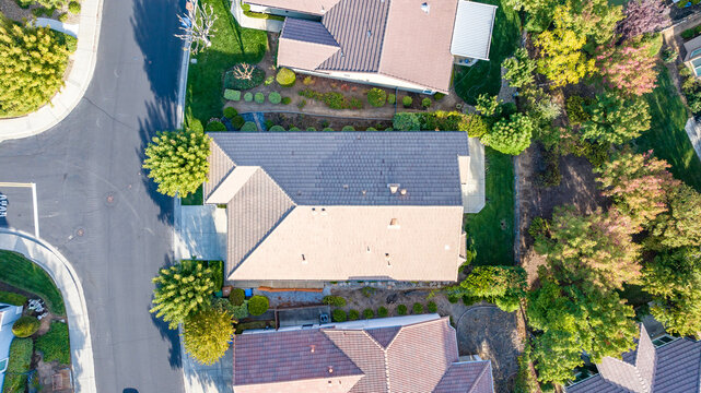 Top down aerial photo over a house with no solar in California