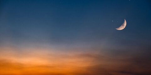 Background of half moon and starry sky and sunset Greeting card for the holy month of Ramadan of islam © Photo Sesaon