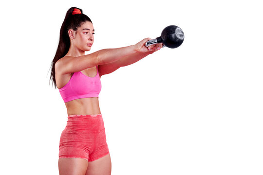 Fitness, woman and kettlebell swing for power, muscles and isolated on a transparent png background. Sports, exercise and strong female athlete lifting weights with focus, training and workout action