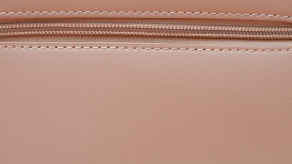 full frame detailed texture of brown leather with zipper