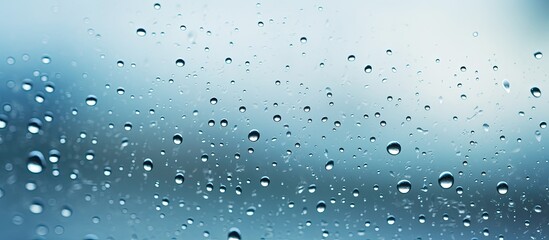 Daytime rain falling on a cars windshield - obrazy, fototapety, plakaty