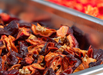 Brown hot Pot Congo Chili fruits cut on plate in close up view