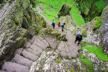 visitors on the steep path up to the monastery, Skellig Michael island, Mainistir Fhionáin (St....