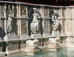 Fototapeta na wymiar Siena, SI, Italy - February 20, 2023: Detail of Fonte Gaia is a monumental fountain in Piazza del Campo