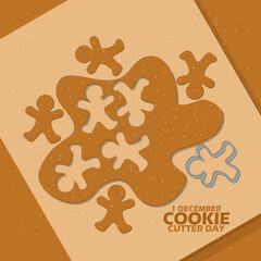 Cake dough being molded with a cookie cutter on board, with bold text on brown background to celebrate National Cookie Cutter Day on December 1