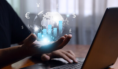Global currency exchange concept, Businessman holding virtual world with dollar yuan yen euro and pound sterling sign for money forex trading. - obrazy, fototapety, plakaty