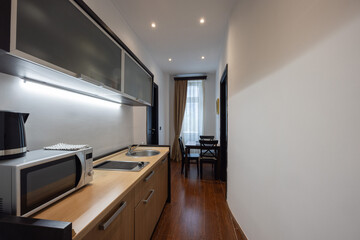 Small kitchen interior with appliances