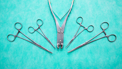 Flat lay of stainless forceps medical scissors. Medical instruments. Medical Surgical Instrument. Equipment used in surgery.