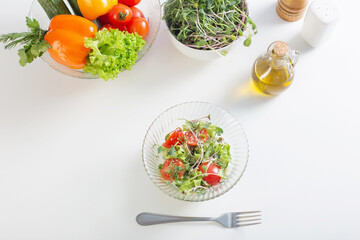 healthy vegetarian salad on white table